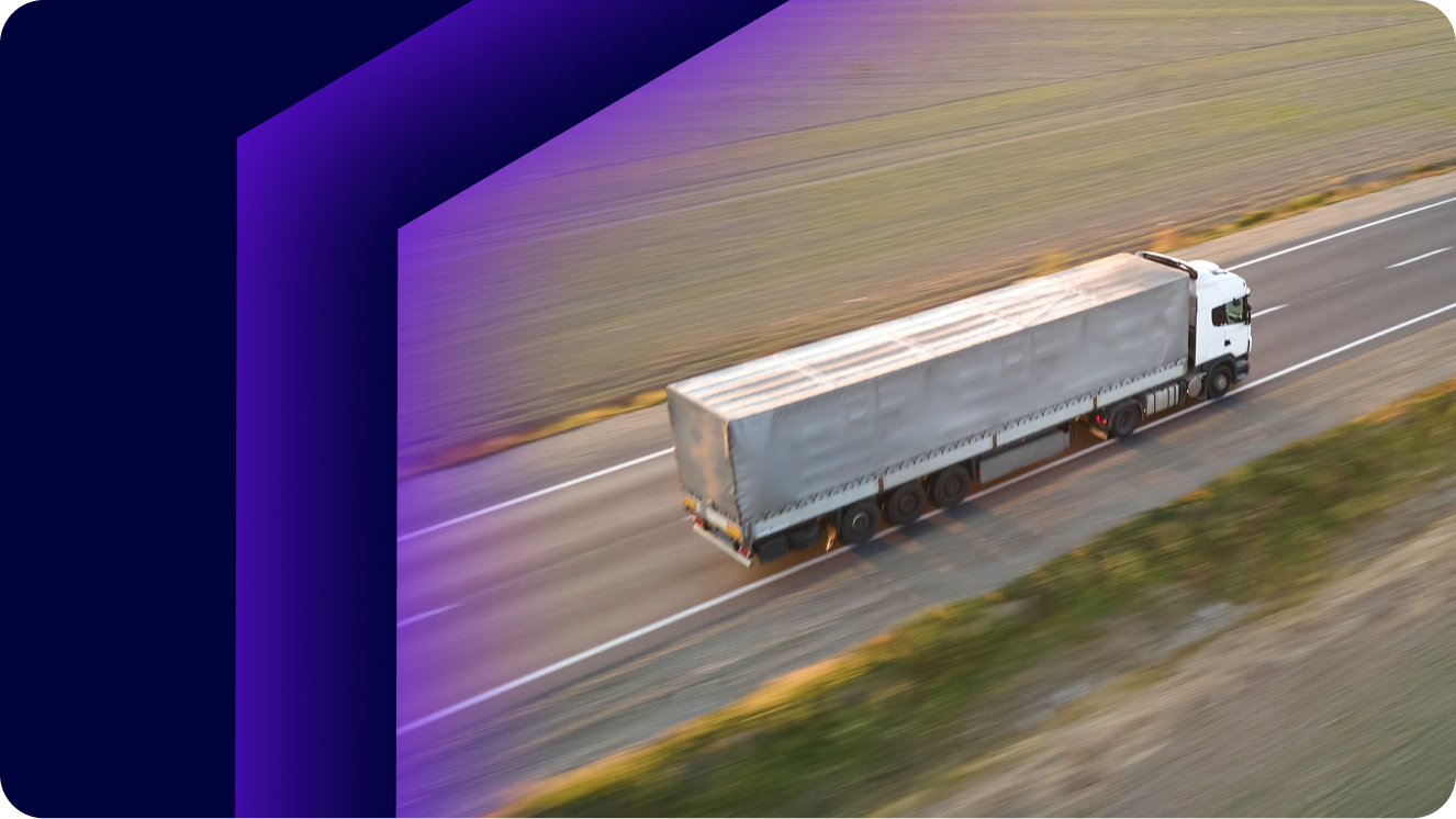 Image of an arial view of a freight truck on a highway